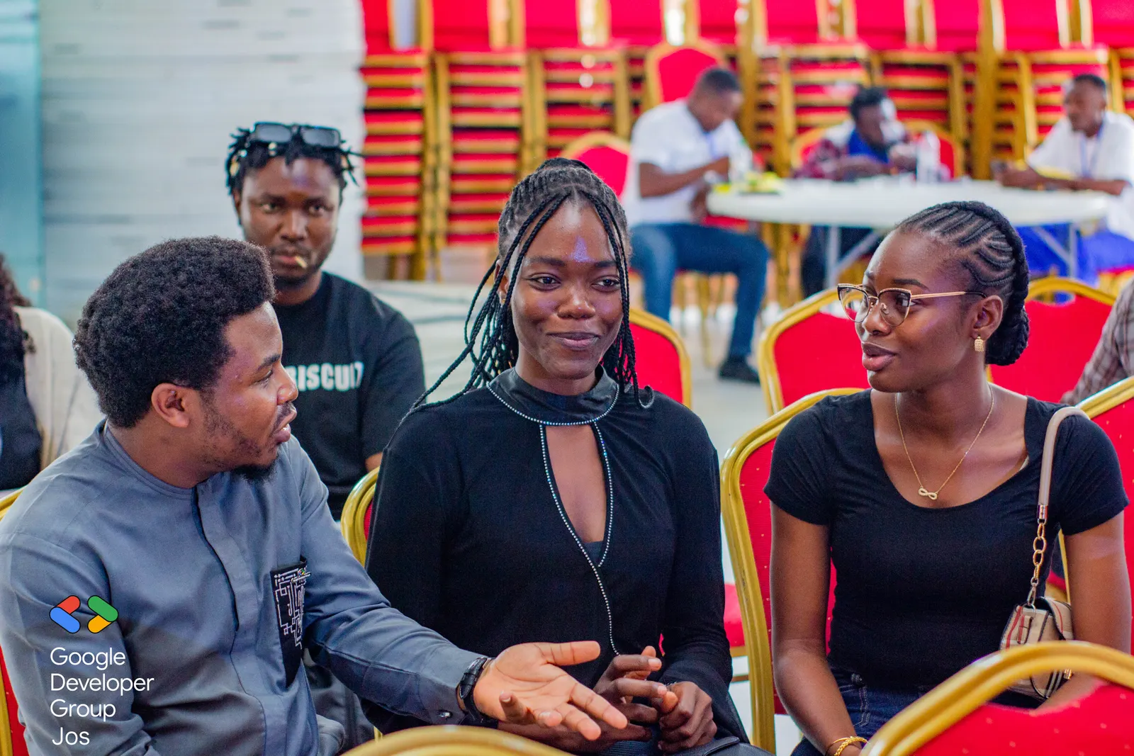 Attendees chatting between sessions